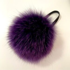 Purple fox fur pom pom purse charm